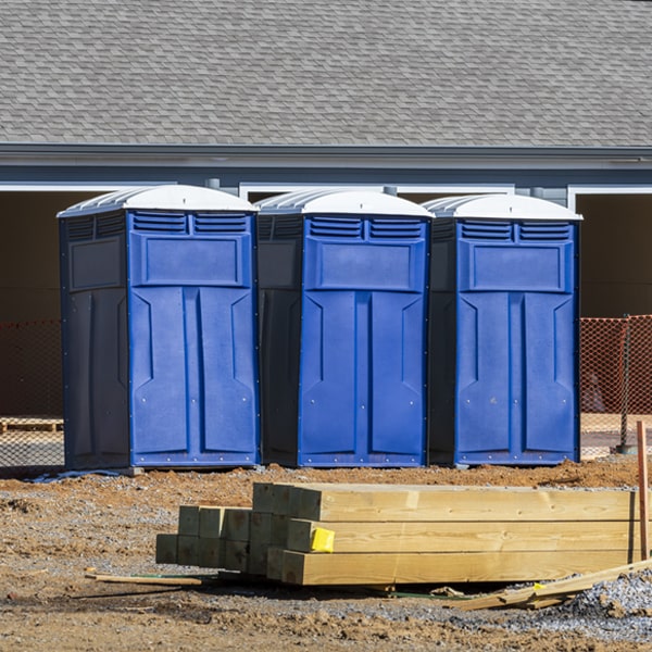 what is the cost difference between standard and deluxe porta potty rentals in Dunnavant